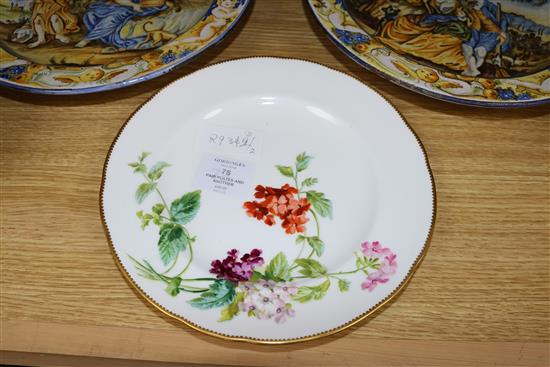 A pair of majolica plates and another